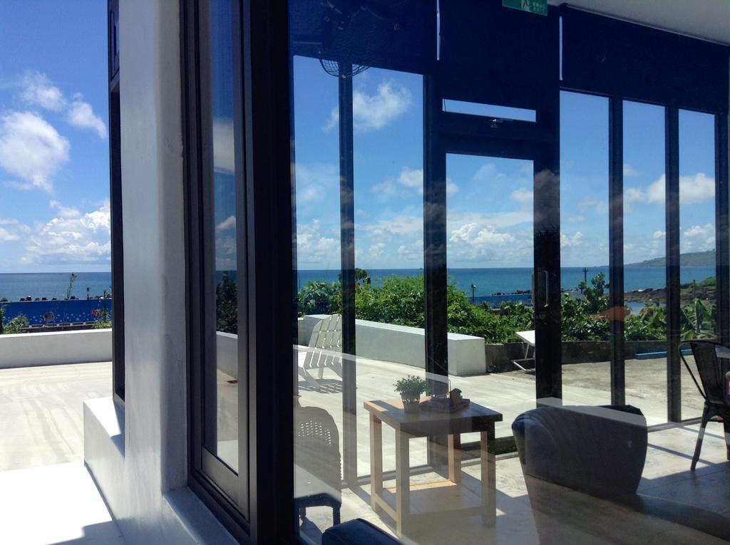 Sea Shore Hotel Manzhou Bagian luar foto