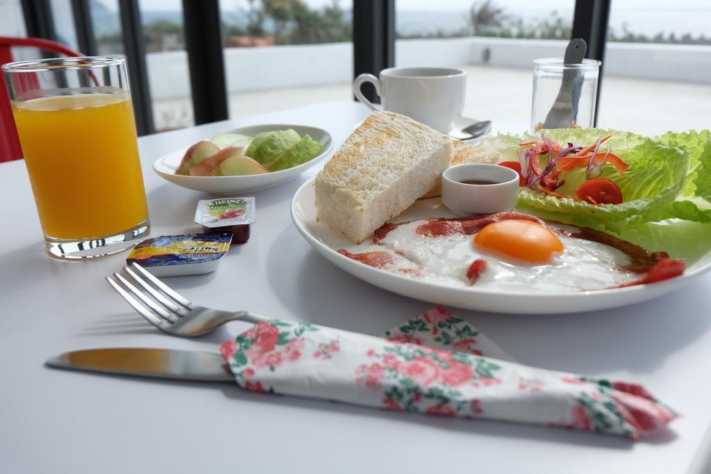 Sea Shore Hotel Manzhou Bagian luar foto