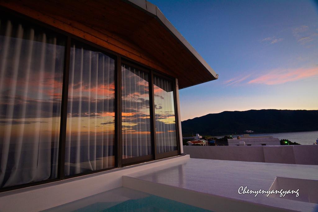 Sea Shore Hotel Manzhou Bagian luar foto