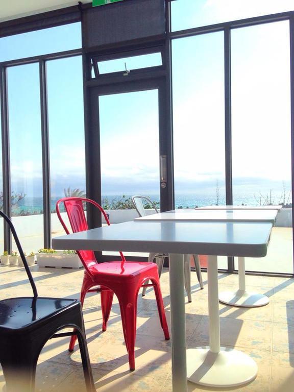 Sea Shore Hotel Manzhou Bagian luar foto