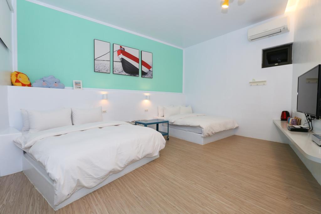Sea Shore Hotel Manzhou Bagian luar foto
