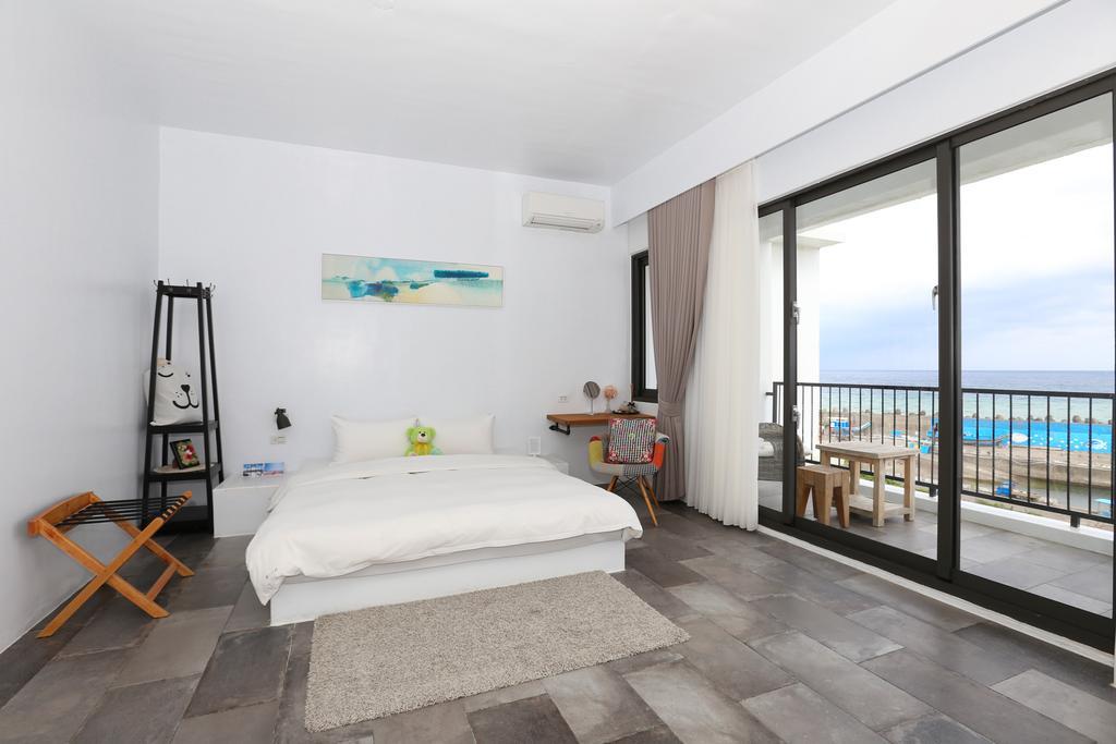 Sea Shore Hotel Manzhou Bagian luar foto