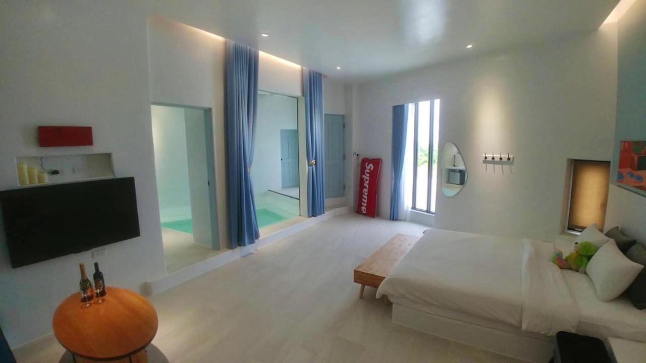 Sea Shore Hotel Manzhou Bagian luar foto