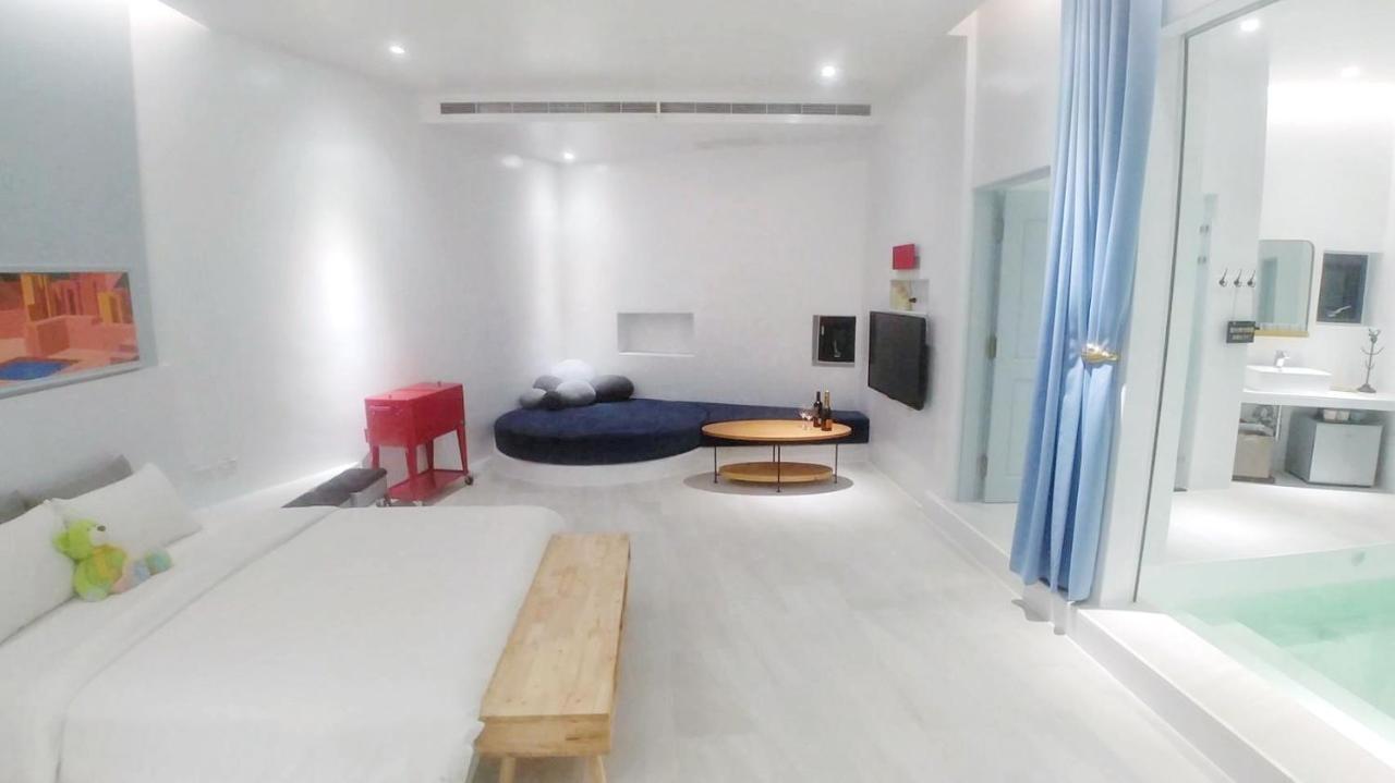 Sea Shore Hotel Manzhou Bagian luar foto