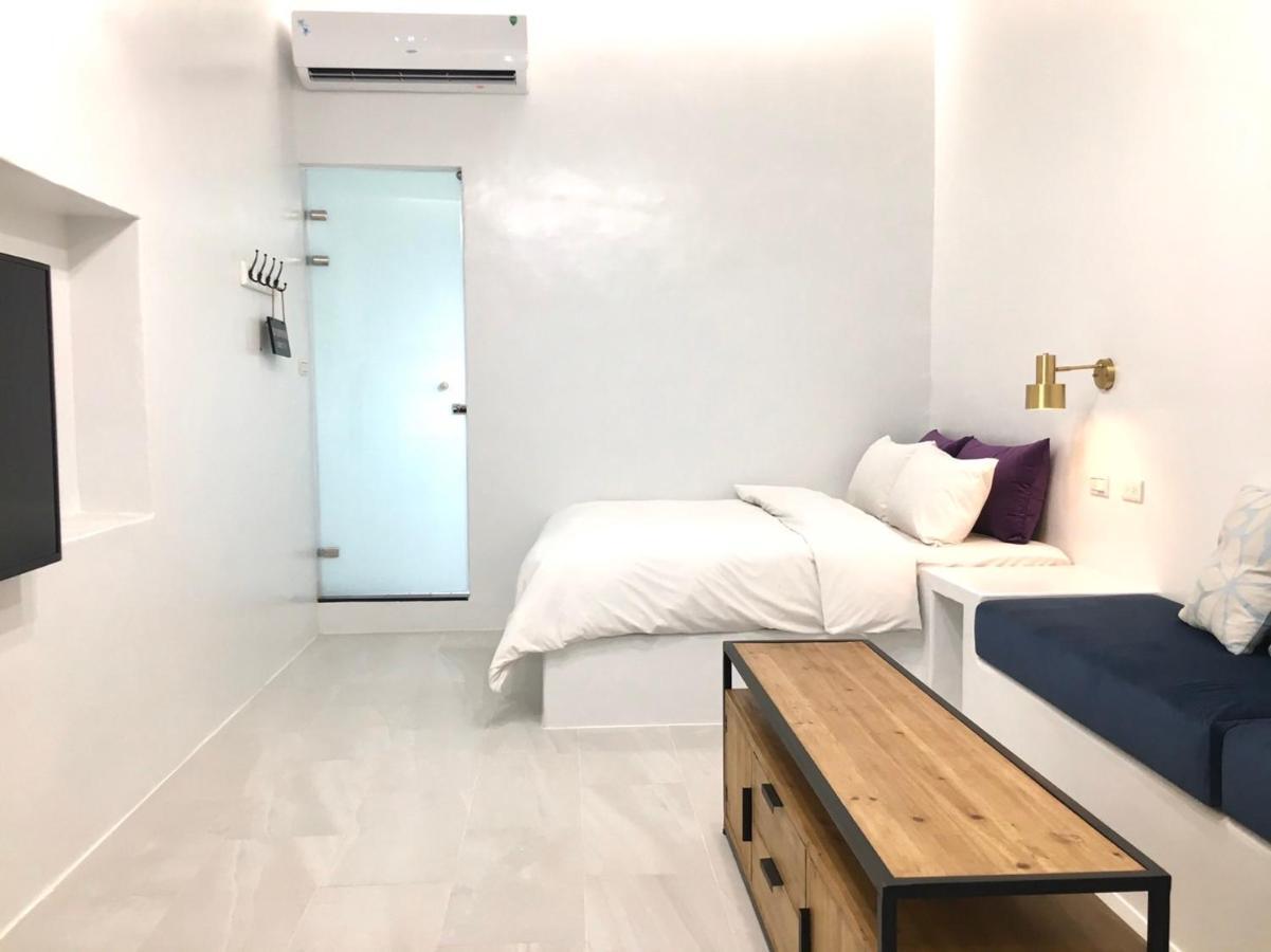 Sea Shore Hotel Manzhou Bagian luar foto